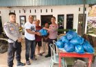 Polres Sijunjung Salurkan 50 Paket Sembako untuk Warga yang Bantu Kelancaran Jalinsum